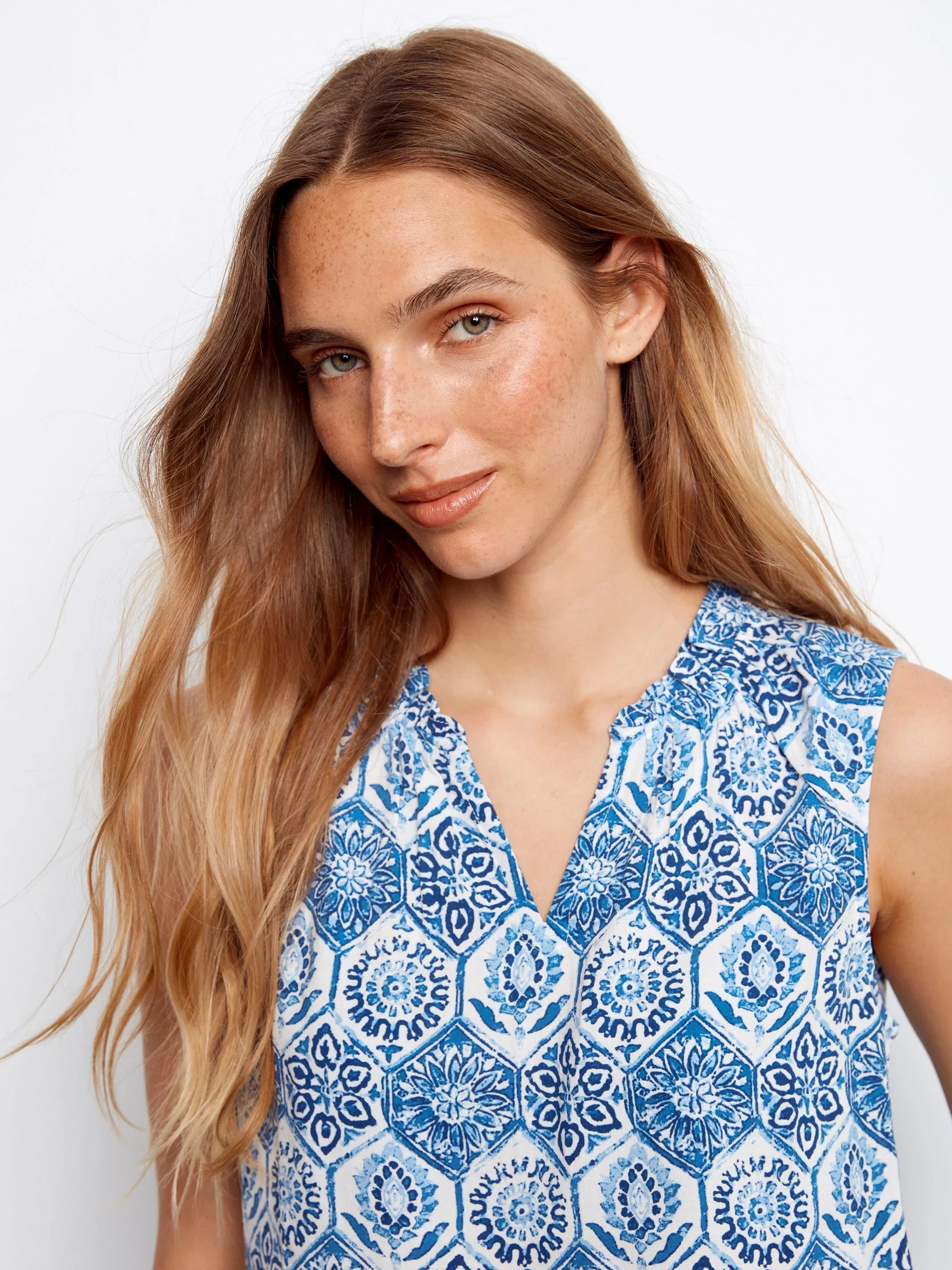 Printed Sleeveless Ruffle Neck Top
